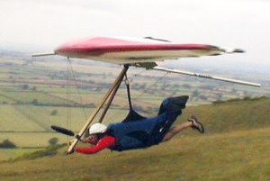 Rigid hang glider launching at Westbury