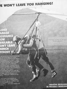Photo of a dual hang glider launching about 1980