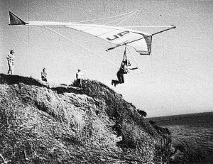 Art based on a photo by Michael Pringle of  Ken DeRussy launching an Ultralight Products Mosquito at Wilcox Beach, Santa Barbara
