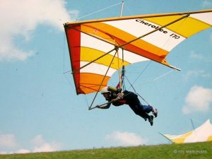 Hang glider launching from a hill
