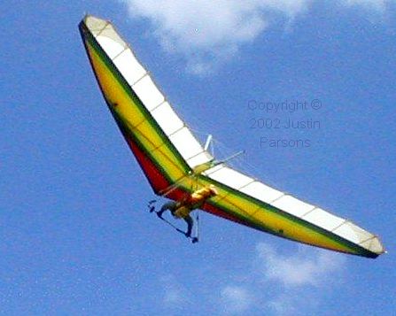 Hang glider in flight viewed from below