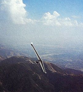 Art based on a photo by Larry Witherspoon of Mitch McAleer flight testing the Apex at Crestline, California
