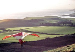 Roly flying his home-constructed Skyhook IIIA standard Rogallo at Kimmeridge in 1975