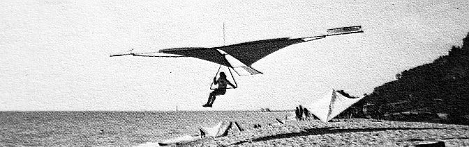 Chuck Slusarcsyk in his own-design Falcon lands on the beach at Elberta, Michigan, in late June or early July 1974