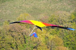 Gary Dear flying a Hiway Scorpion 2 hang glider at Monk's Down, north Dorset, England, in 2018