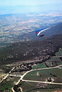 Mitch McAleer flying a hang glider at Elsinore, California. Photo by Dave Freund.