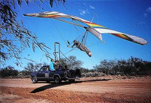 Tony Barton launching in a hang glider by using an ATOL system in southern Arizona. Photo by Mark Sawyer.