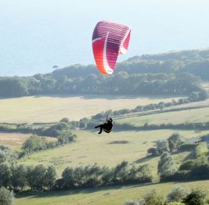 Paraglider in evening lift at Ringstead, July 2015