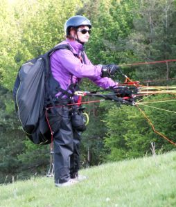 Paraglider pilot preparing to launch at Monk's Down, Dorset, England, in 2016