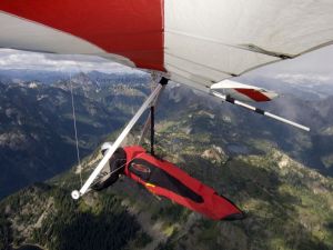 Novelist Vaughn Entwistle flying a hang glider at Rampart Ridge in the Cascades