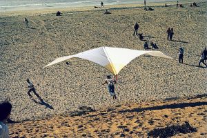 Dick Eipper flying a hang glider at Playa del Rey (Dockweiler Beach) in about 1970. Photo by Doug Morgan.