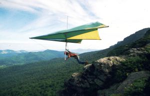 Standard Rogallo hang glider launching from Grandfather Mountain